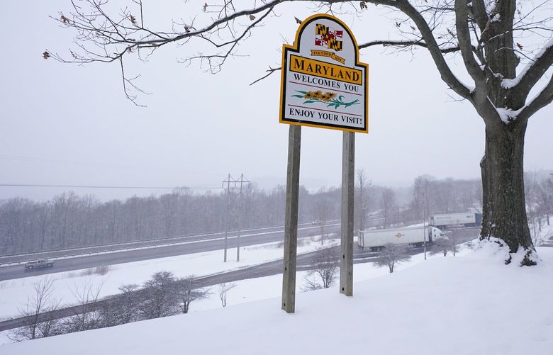 Snow covers the Youghiogheny Overlook Welcome Center along Interstate-68 near Maryland’s west border with West Virginia, Friday, Jan. 28, 2022, in Friendsville, Md. A winter storm is moving into the Mid-Atlantic including blizzard warnings for Maryland’s Eastern Shore. (AP Photo/Julio Cortez) MDJC101 MDJC101