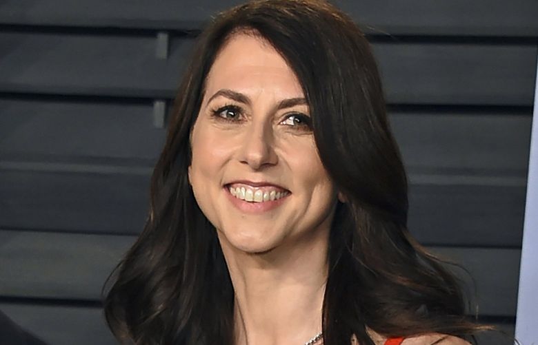 FILE – In this March 4, 2018, file photo, then-MacKenzie Bezos arrives at the Vanity Fair Oscar Party in Beverly Hills, Calif. Scott, philanthropist, author and former wife of Amazon founder Jeff Bezos, has married a Seattle science teacher. Dan Jewett wrote in a letter to the website of the nonprofit organization the Giving Pledge, on Saturday, March 6, 2021, that he was grateful to be able to marry such a generous person and was ready to help her give away her wealth to help others. (Photo by Evan Agostini/Invision/AP, File)