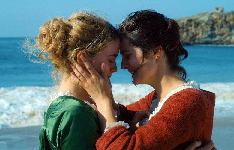 This image released by Neon shows Adèle Haenel, left, and Noémie Merlant in a scene from “Portrait of a Lady on Fire.” (Neon)