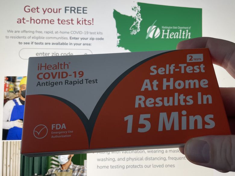 华盛顿州正在通过网站 sayyescovidhometest.org 提供免费的家庭 COVID-19 快速检测试剂盒。 (特拉维斯·内斯 / 西雅图时报)