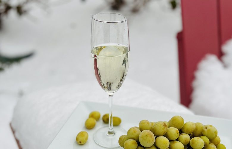 By harvesting grapes frozen on the vine and crushing them while still frozen, vintners are able to produce a sweeter, more acidic dessert wine.