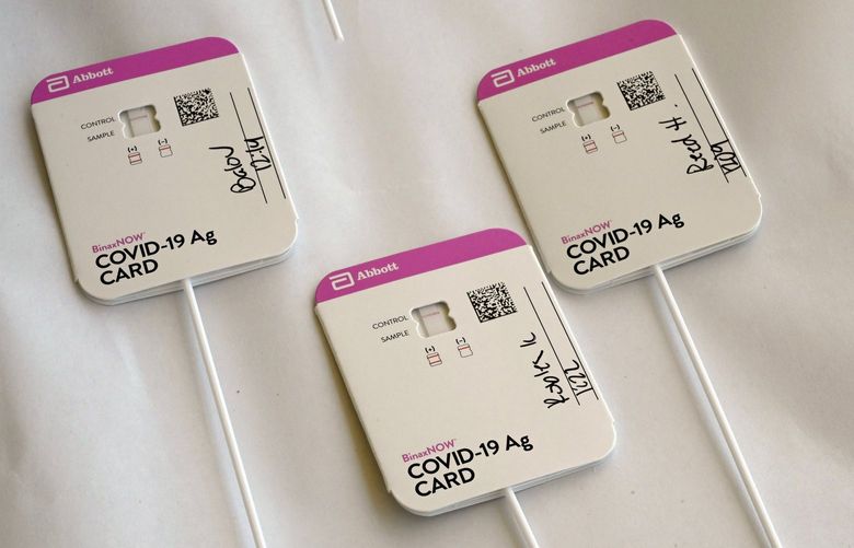 Rapid COVID-19 tests swabs are processed at Palos Verdes High School in Palos Verdes Estates, California, Tuesday, Aug. 24, 2021. (Brittany Murray/The Orange County Register via AP)