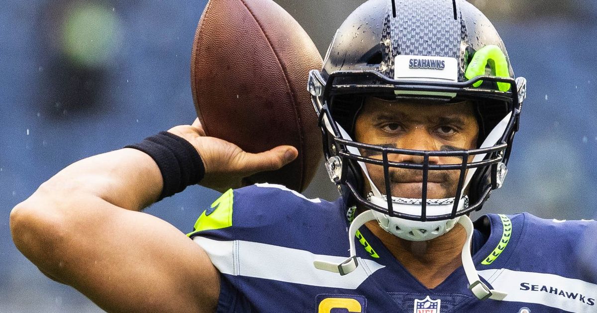 Seattle Seahawks quarterback Russell Wilson and wide receiver DK Metcalf  celebrate a touchdown during an NFL football game against the Detroit  Lions, Sunday, Jan. 2, 2022, in Seattle. The Seahawks won 51-29. (