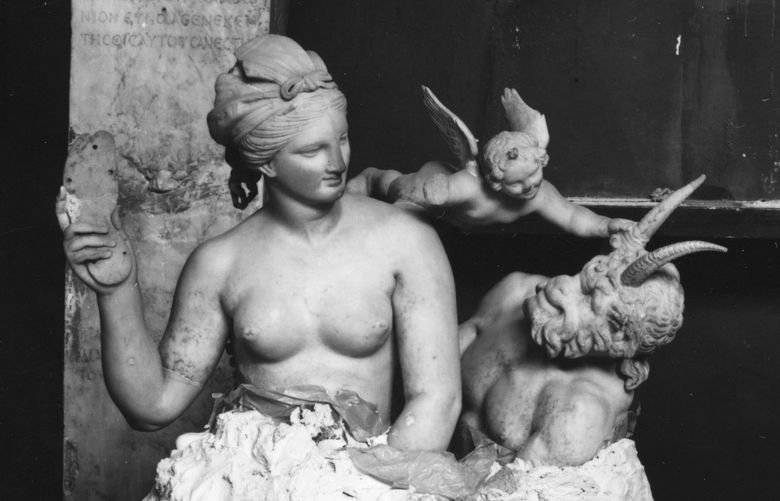 In an undated photo from the Hellenic Ministry of Culture and Sports/Hellenic Organization of Cultural Resources Development; National Archaeological Museum, Athens, a marble grouping of Aphrodite, Pan and Eros that were covered in plaster before the German invasion at the National Archeological Museum in Athens. Scholars are increasingly focusing attention on the seizure and excavation of antiquities from Greece and other countries by German forces during World War II. (Hellenic Ministry of Culture and Sports/Hellenic Organization of Cultural Resources Development; National Archaeological Museum, Athens, via The New York Times) — NO SALES; FOR EDITORIAL USE ONLY WITH NYT STORY NAZI LOOTED ARTIFACTS BY MILTON ESTEROW FOR JAN. 18, 2022. ALL OTHER USE PROHIBITED. —