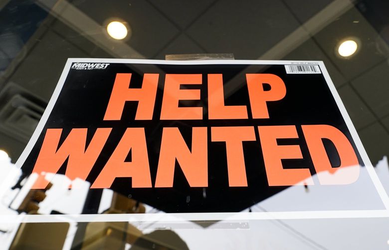 A help wanted sign is posted on a restaurant in Media, Pa. (AP Photo/Matt Rourke)
