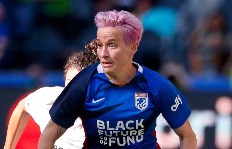 Lumen Field – OL Reign vs. Portland Thorns – 082921

OL Reign forward Megan Rapinoe dribbles the ball against the Portland Thorns FC during the first half Sunday, Aug. 29, 2021, in Seattle, Wash. 218052