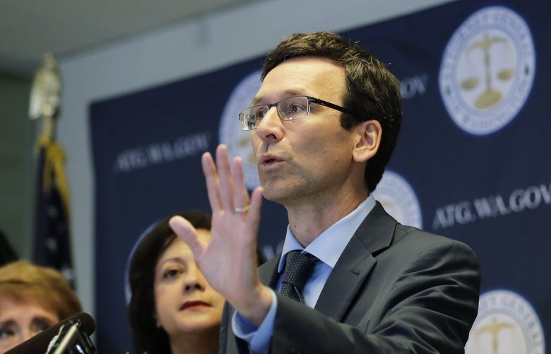 Washington Attorney General Bob Ferguson talks to reporters, Monday, Aug. 26, 2019, during a news conference in Seattle. Nineteen states, including Washington, are suing over the Trump administration’s effort to alter a federal agreement that limits how long immigrant children can be kept in detention. (AP Photo/Ted S. Warren)
