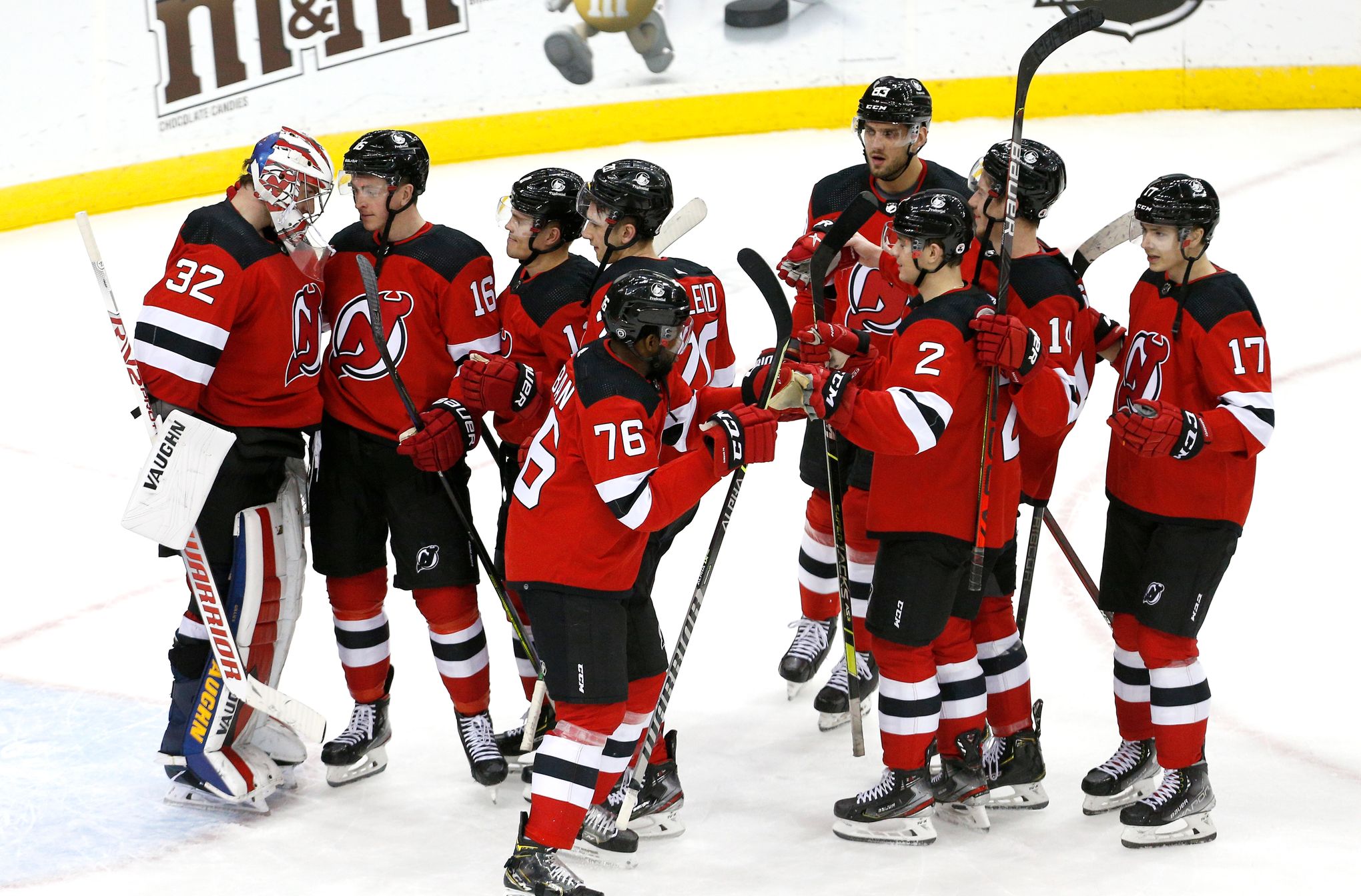 Devils' Jack Hughes Celebrates Michael McLeod, Nathan Bastian