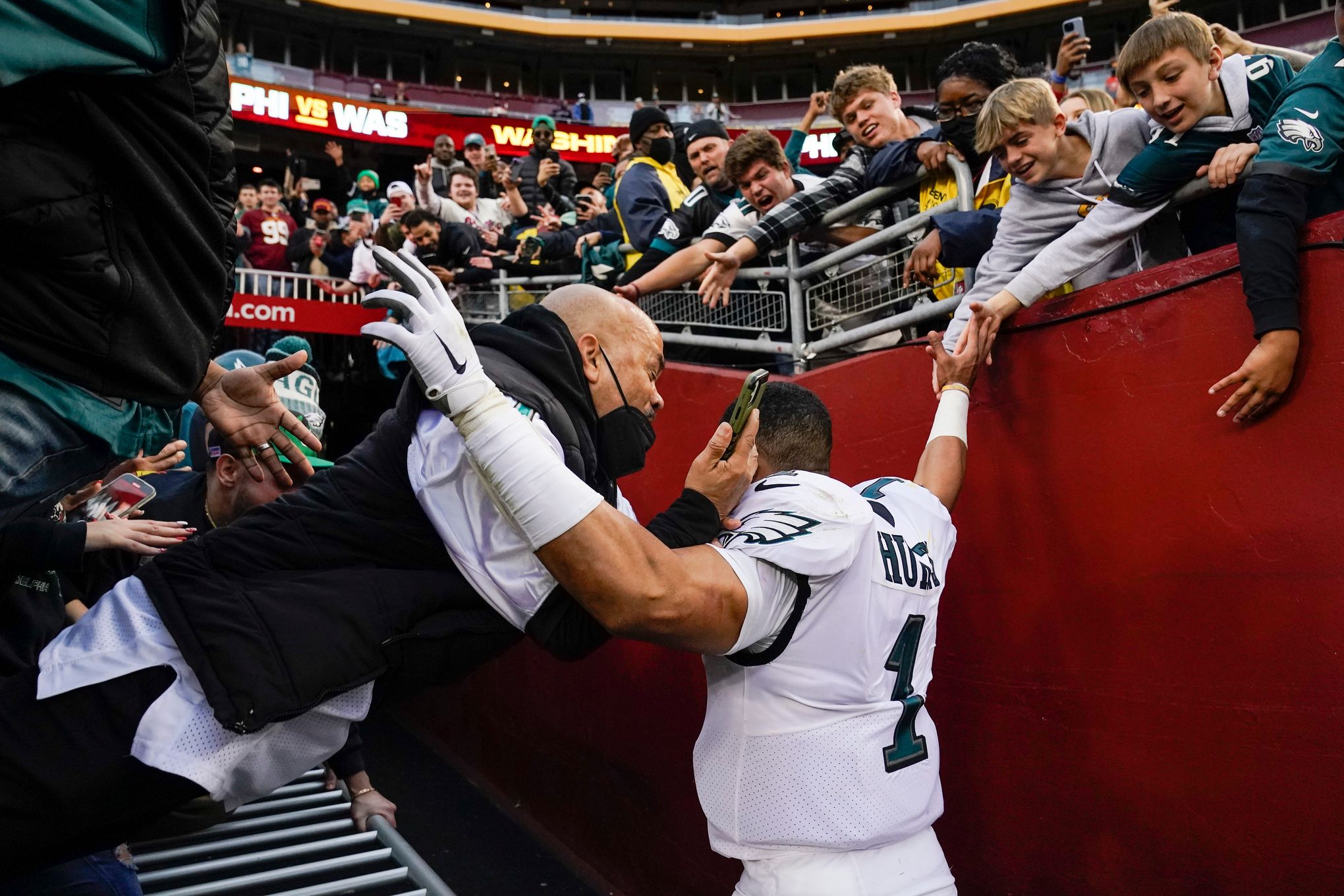 Eagles beat Washington, get help to clinch playoff berth