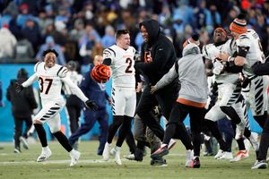 Cincinnati Bengals place kicker Evan McPherson (2) runs for the play during  an NFL wild-card football game against the Baltimore Ravens on Sunday, Jan.  15, 2023, in Cincinnati. (AP Photo/Emilee Chinn Stock