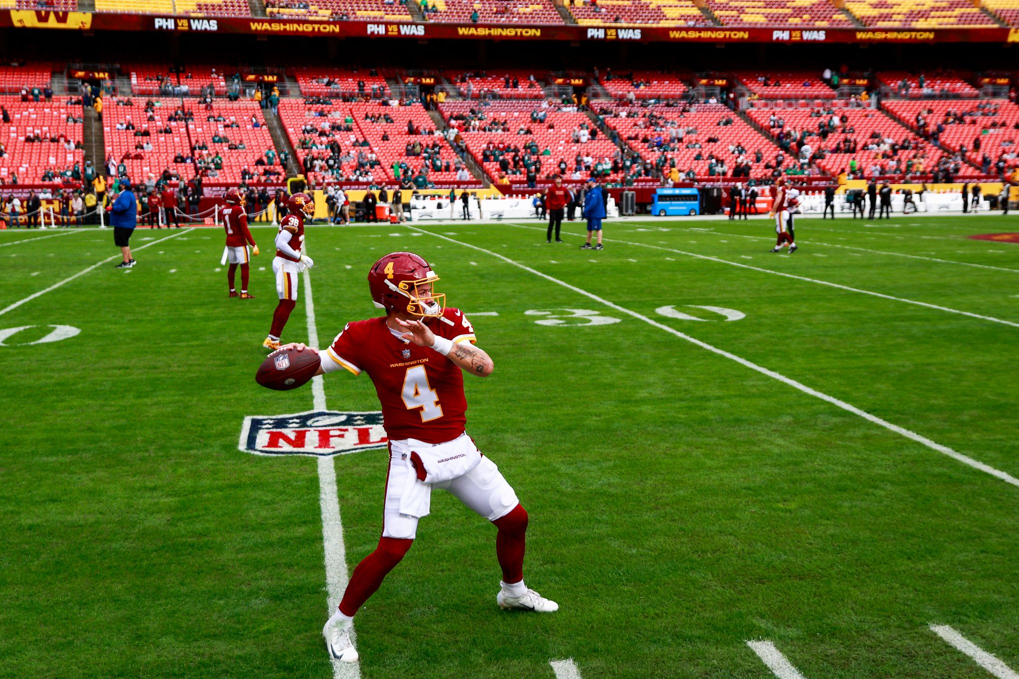 Washington Football Team quarterback Taylor Heinicke (4) warms up