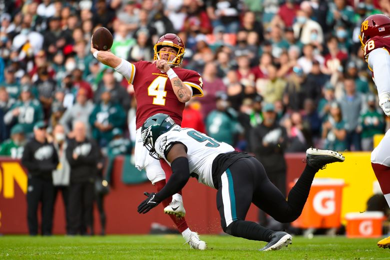 Washington Football Team quarterback Taylor Heinicke (4) throws