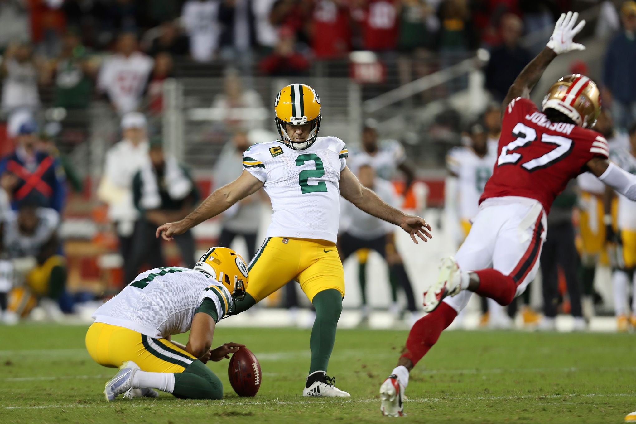 Crosby kicks 51-yarder as Packers go on to win NFC thriller