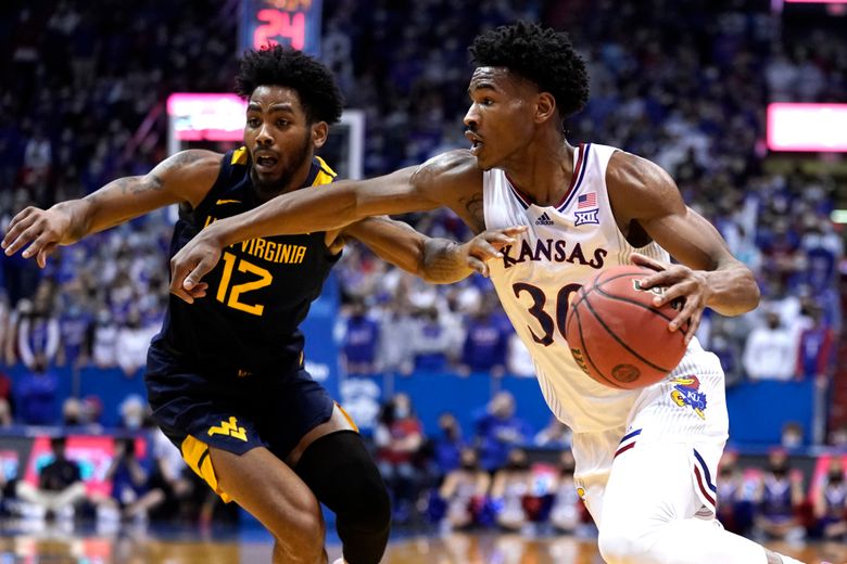 No. 9 Kansas uses big 2nd half to stuff West Virginia, 85-59