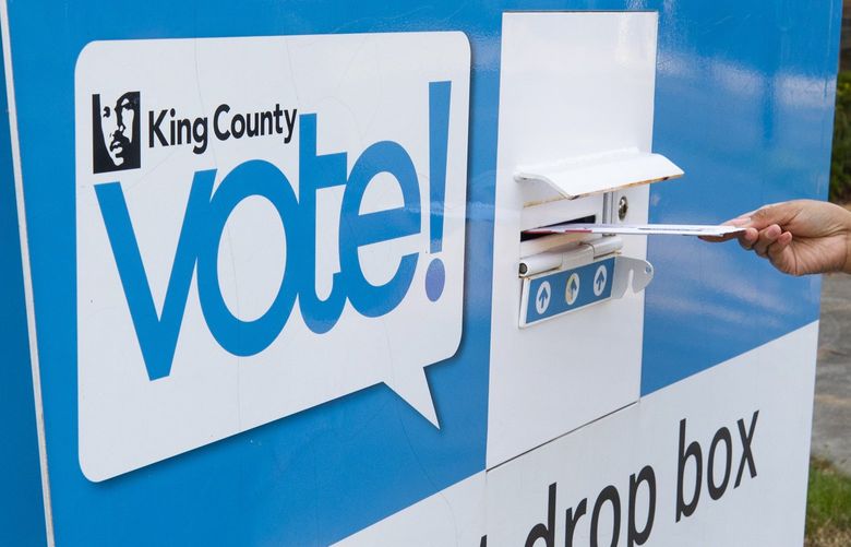 A woman who did not want to be identified drops off a ballot in the drop box located at the Rainier Beach Community Center, 8825 Rainier Ave. S., in Seattle Tuesday, August 3, 2021. King County, with more than 1.3 million registered voters, is the largest jurisdiction in the United States to conduct all elections by mail.
217811