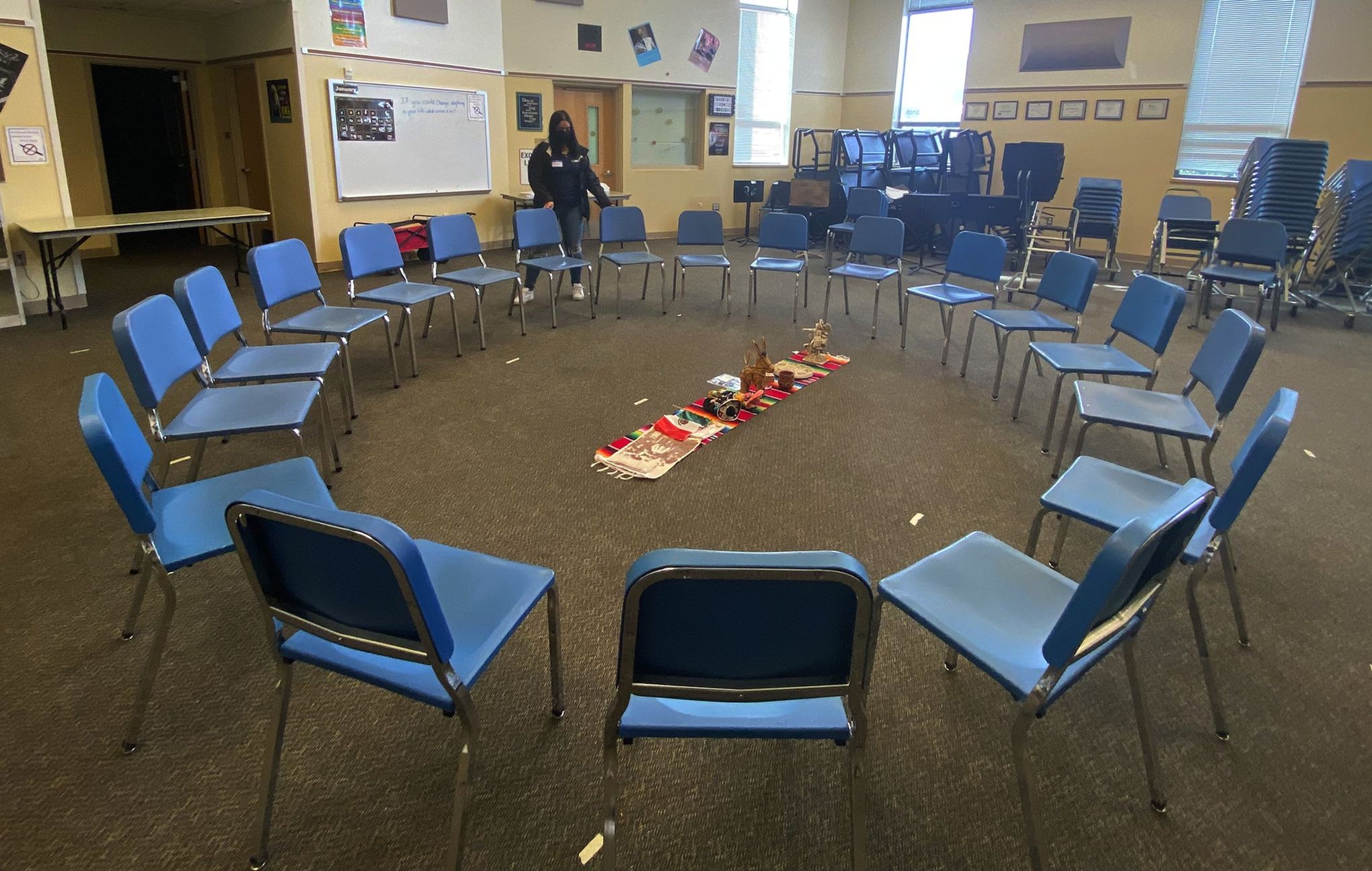 A circle of chairs set up for a student and parent workshop