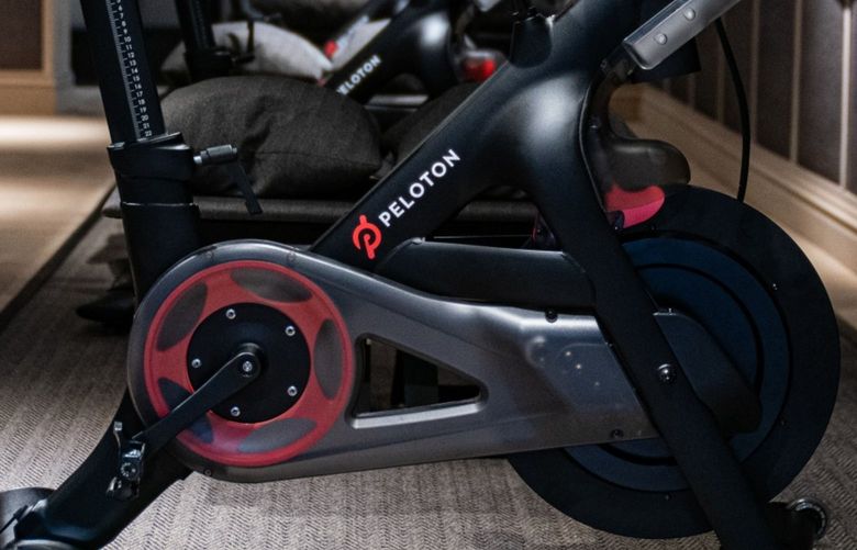 Peloton stationary bicycles on display at the company’s showroom on Madison Avenue in New York, in 2019. 775454160