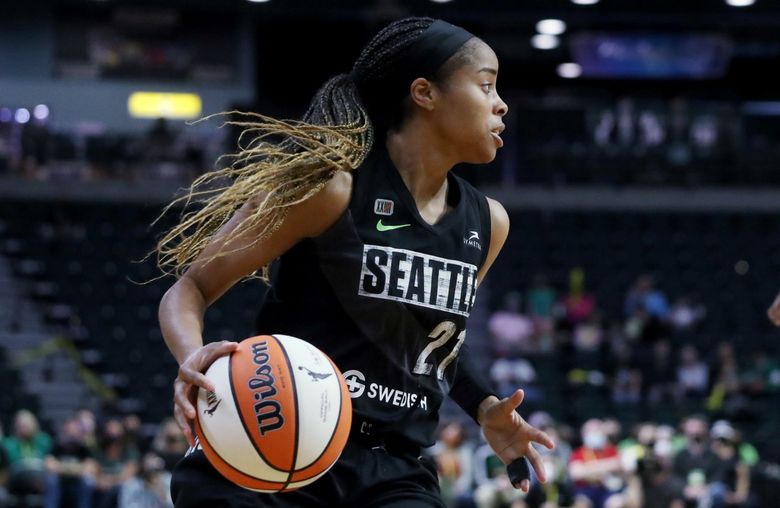 Los Angeles Sparks guard Jordin Canada brings the ball up court