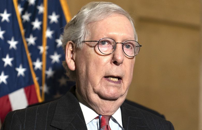 Senate Minority Leader Mitch McConnell of Ky., speaks to reporters on Capitol Hill in Washington, Tuesday, Feb. 8, 2022. (AP Photo/Mariam Zuhaib) DCMZ101 DCMZ101