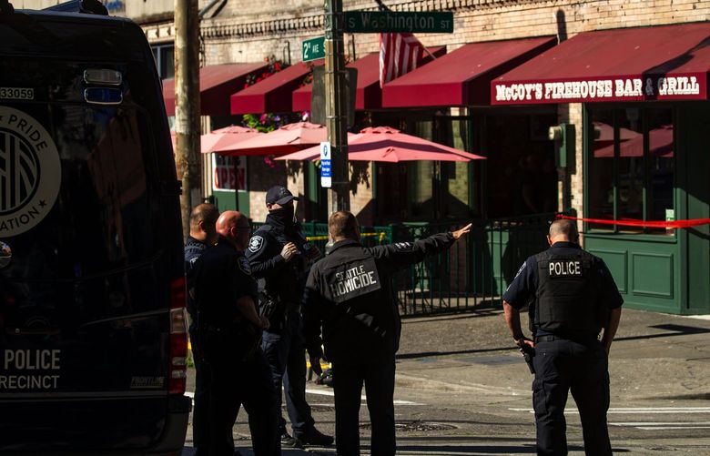 Seattle Police investigate a shooting using their mobile precinct van in Pioneer Square near Trinity nightclub where multiple people were shot early Sunday morning, July 25, 2021.  –