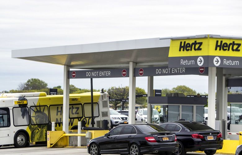 A Hertz Global Holdings Inc. shuttle bus exits the company’s rental location at LaGuardia Airport (LGA) in the Queens borough of New York, U.S., on Sunday, May, 6, 2018. Hertz Global Holdings Inc. is scheduled to release earnings figures on May 7. Photographer: Victor J. Blue/Bloomberg 775161976