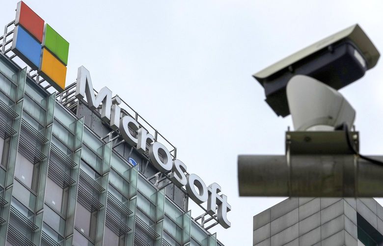 A security surveillance camera is seen near the Microsoft office building in Beijing, Tuesday, July 20, 2021. The Biden administration and Western allies formally blamed China on Monday for a massive hack of Microsoft Exchange email server software and asserted that criminal hackers associated with the Chinese government have carried out ransomware and other illicit cyber operations. (AP Photo/Andy Wong) XAW104