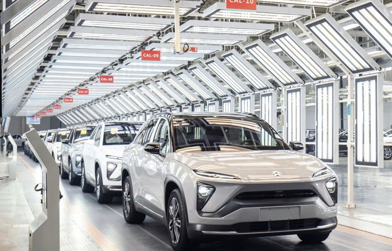 Nio Inc. electric vehicles are rolled off the production line during an event at the automaker’s factory in Hefei, Anhui province, China, on Wednesday, April 7, 2021. Nio said it delivered 7,257 cars last month, bringing its first quarter total to 20,060 vehicles – a 423% jump from the previous year period. Photograph: Qilai Shen/Bloomberg