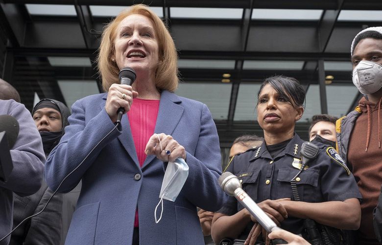 Mayor Jenny Durkan, flanked by Police Chief Carmen Best, address thousands of demonstrators from the steps of the Emergency Operations Center Tuesday.

Tuesday in Seattle saw a continuation of demonstration and protest over police conduct, but this time demonstrators got what they wanted:  an audience with Mayor Jenny Durkan and Police Chief Carmen Best.

Photographed Tuesday, June 2, 2020 214134 214134