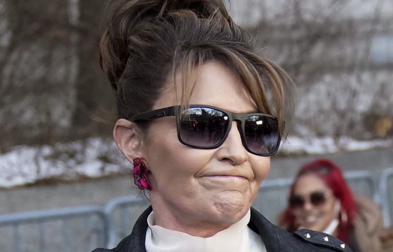 FILE â€” Former Alaska Gov. Sarah Palin reacts as she leaves a courthouse in New York, Monday, Feb. 14, 2022. Palin lost her libel lawsuit against The New York Times on Tuesday, Feb. 15, 2022, when a jury rejected her claim that the newspaper maliciously damaged her reputation by erroneously linking her campaign rhetoric to a mass shooting. (AP Photo/Seth Wenig, File) RDNY210 RDNY210