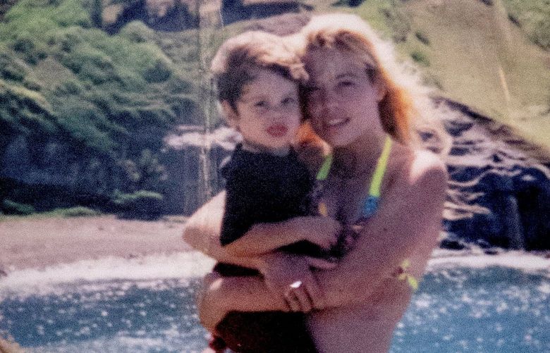 Photo is of Stacy Falcon-Dewey and her son Jacob Dewey on vacation in Hawaii, shortly before the murders occurred.