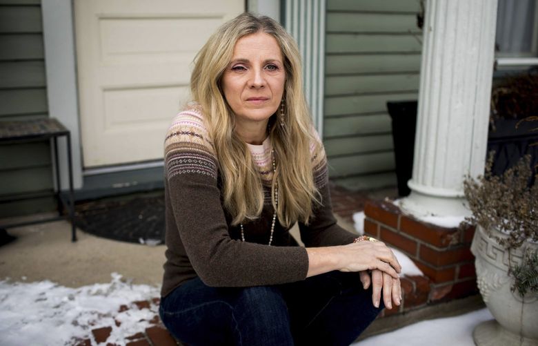 Victoria Linssen, who pays about $500 a month to the student loan lending giant Navient, at her home in Muncie, Ind., Jan. 29, 2022. A deal between 39 states and Navient, which was accused of unfairly ensnaring borrowers, would erase $1.7 billion in private student loans, but thousands who made their payments on time will still have to pay. (Kaiti Sullivan/The New York Times)