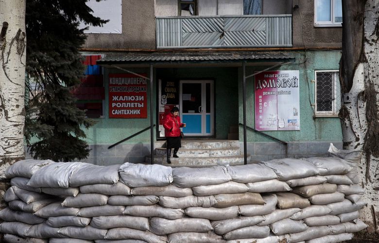 A barricaded shop in Novoluhanske, a town in eastern Ukraine, Feb. 20, 2022. Russian military exercises on Ukraine’s border were extended indefinitely on Sunday, leaving an unrelenting threat hanging over a vastly outgunned Ukrainian military and jittery population after a weekend of shelling and evacuations that American and Ukrainian officials warned was an effort by Moscow to create a pretext for an invasion. (Tyler Hicks/The New York Times) XNYT128 XNYT128