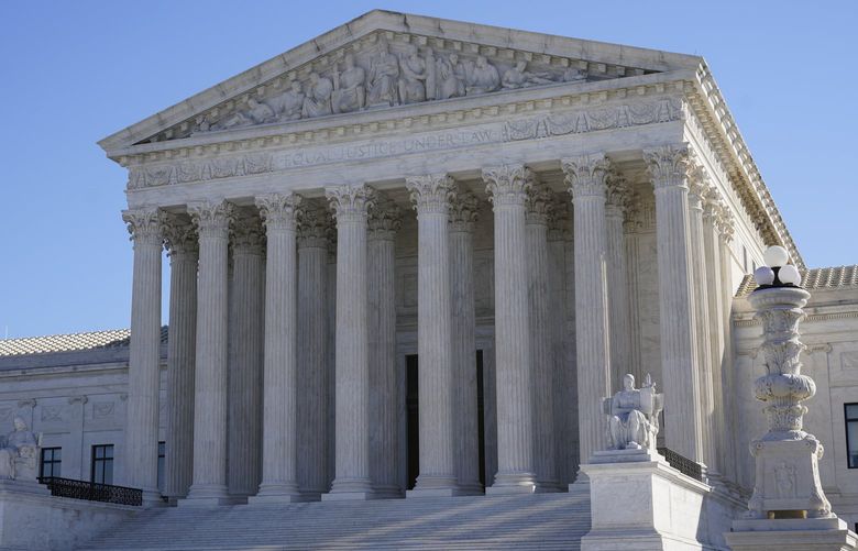 Visitors walk outside the Supreme Court building on Capitol Hill in Washington, Monday, Feb. 21, 2022. (AP Photo/Patrick Semansky) DCPS101 DCPS101