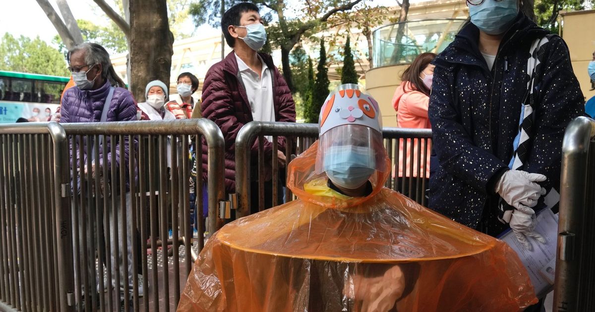 Hong Kong’s new COVID cases top 10,000 in spiraling outbreak The