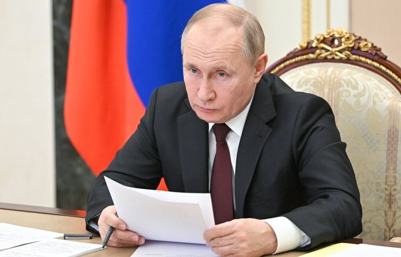 Russian President Vladimir Putin attends a meeting on economic issues via videoconference in Moscow, Russia, Thursday, Feb. 17, 2022. (Alexei Nikolsky, Sputnik, Kremlin Pool Photo via AP)