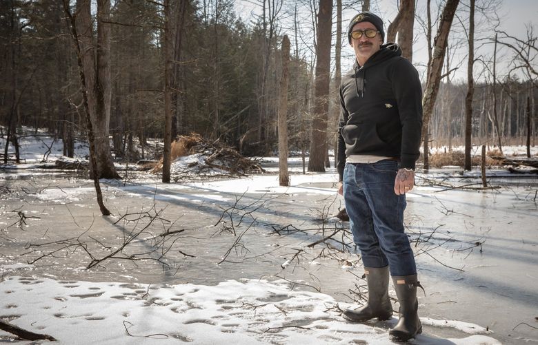 Andrew Joseph, who moved into his home in Saugerties, a small town two hours north of New York City, on Feb. 17, 2022. City dwellers, who retreated to rural areas in the pandemic, now see drawbacks, from pests and social isolation to the difficulty of finding day care and health care. (Tony Cenicola/The New York Times) XNYT159 XNYT159