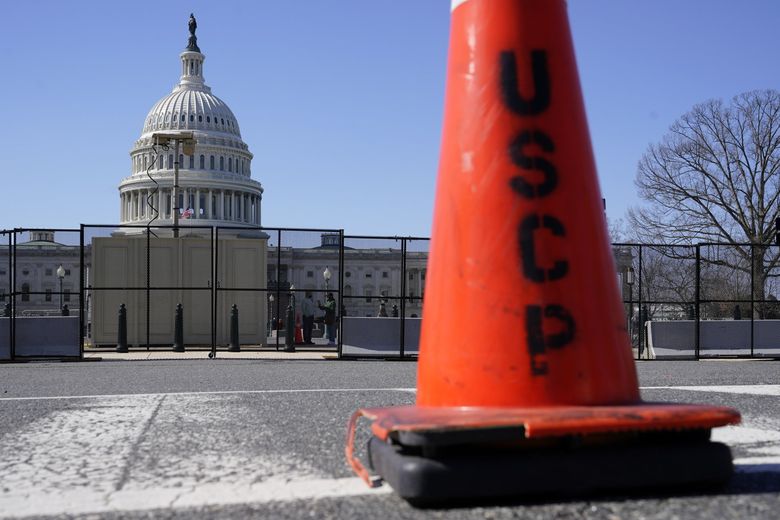 A security fence erected in preparation for President Joe Biden's State of the Union address surrounds the US Capitol on Capitol Hill in Washington on Sunday, February 27, 2022. (Patrick Semansky/The Associated Press)