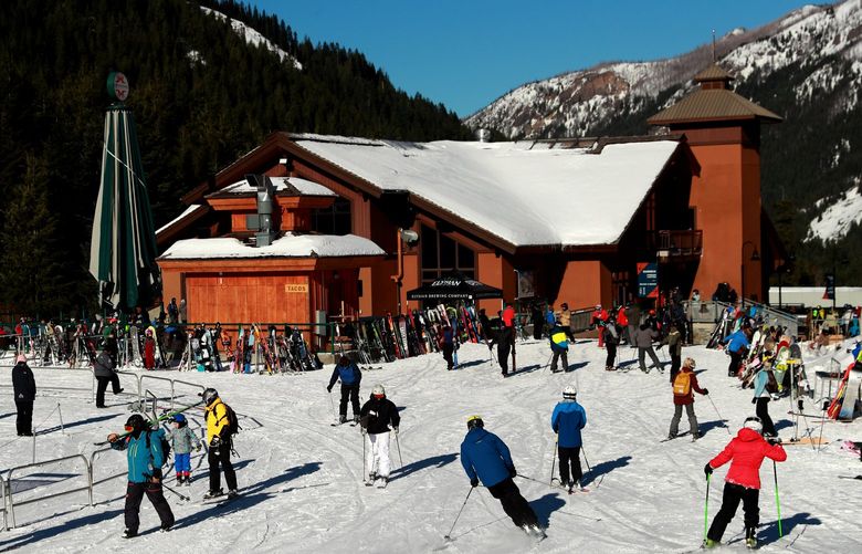 Skiers navigate Crystal Mountain ski resort Wednesday, December 2, 2020.    215798