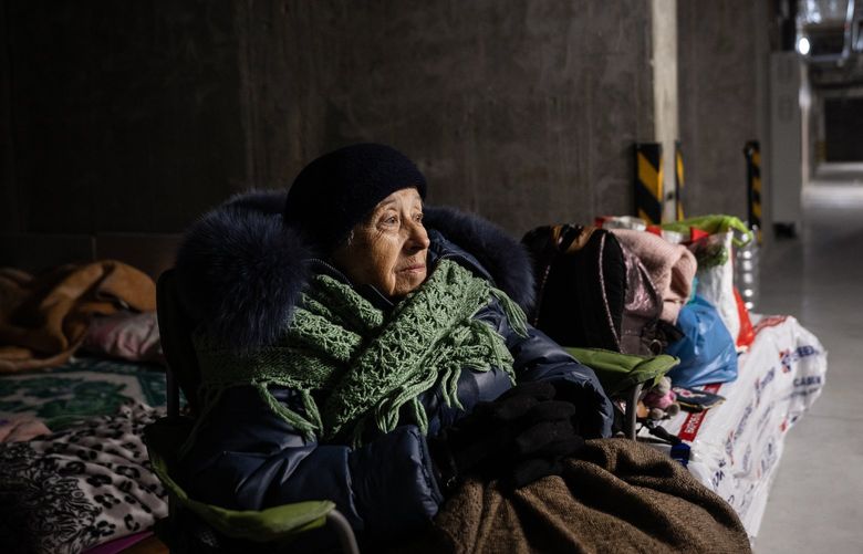 Svetlana Akimova, 82, shelters in a parking garage after heavy fighting took place outside her apartment building in Kyiv, Ukraine, on Saturday, Feb. 26, 2022. When the Russian leader ordered his nuclear forces into “special combat readiness,” the U.S. could have gone on high alert. Instead, the administration tried not to inflame him. (Lynsey Addario/The New York Times) – NO SALES – XNYT116 XNYT116