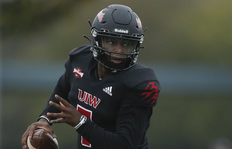 Incarnate Word Cardinals quarterback Cameron Ward (7) runs the ball during the second quarter against the Stephen F. Austin Lumberjacks in an opening round of the FCS playoffs at Benson Stadium in San Antonio, Texas, Saturday, Nov. 27, 2021.