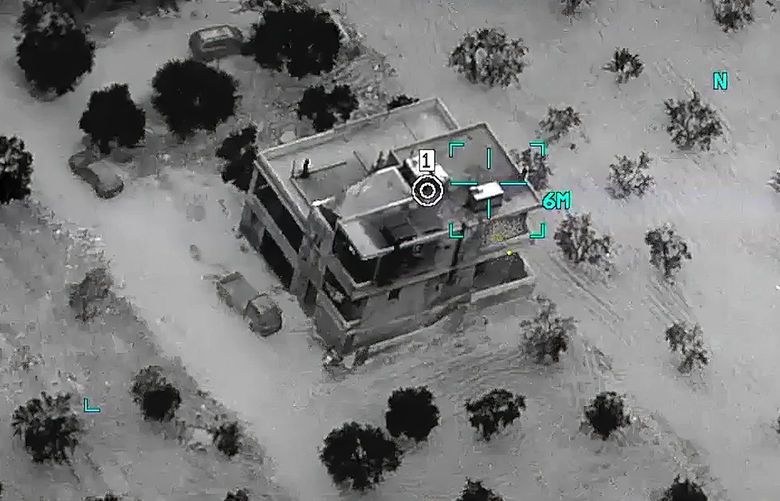 This image from video provided by the Department of Defense and released on Feb. 3, 2022, shows the compound before a raid where Abu Ibrahim al-Hashimi al-Qurayshi, leader of the Islamic State Group, died in Syria’s northwestern Idlib province. A U.S. official says that the militant leader, one of the world’s most wanted terrorists, exploded a bomb that killed himself and members of his family during the overnight raid by an elite U.S. military force. (Department of Defense via AP) WX208 WX208