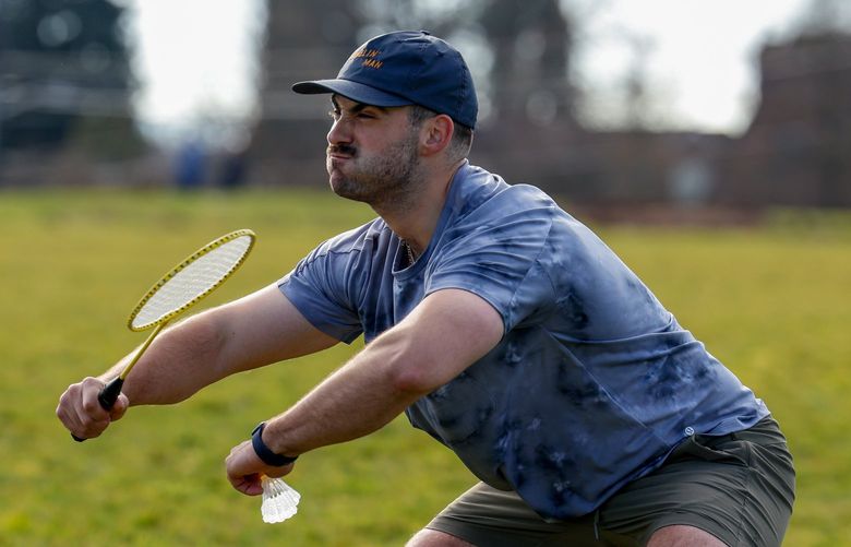 Maple Leaf Reservoir Park – Badminton LO – Lines Only – 020622

Logan Rusconi flexes after winning a point during a sunny badminton game at Maple Leaf Reservoir Park Sunday, Feb. 6, 2022, in Seattle, Wash. Rusconi and his roommates saw the weather this morning and went to Target and bought the badminton set and a spike ball game to join their pickle ball equipment for the “Maple Leaf Olympics”.  219525