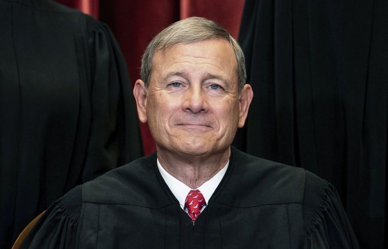 FILE – In this April 23, 2021, file photo Chief Justice John Roberts sits during a group photo at the Supreme Court in Washington. The Supreme Court on Friday rejected a plea from South Carolina to reimpose the death penalty on a South Carolina inmate whose death sentence stood for two decades until a federal appeals court threw it out in August. Chief Justice John Roberts did not comment in denying the state’s request to stop the clock on a lower court order in favor of inmate Sammie Lee Stokes. (Erin Schaff/The New York Times via AP, Pool, File)