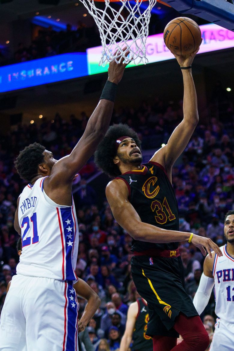 Embiid's dunk, triple-double highlight 76ers' win over Cavs | The Seattle  Times