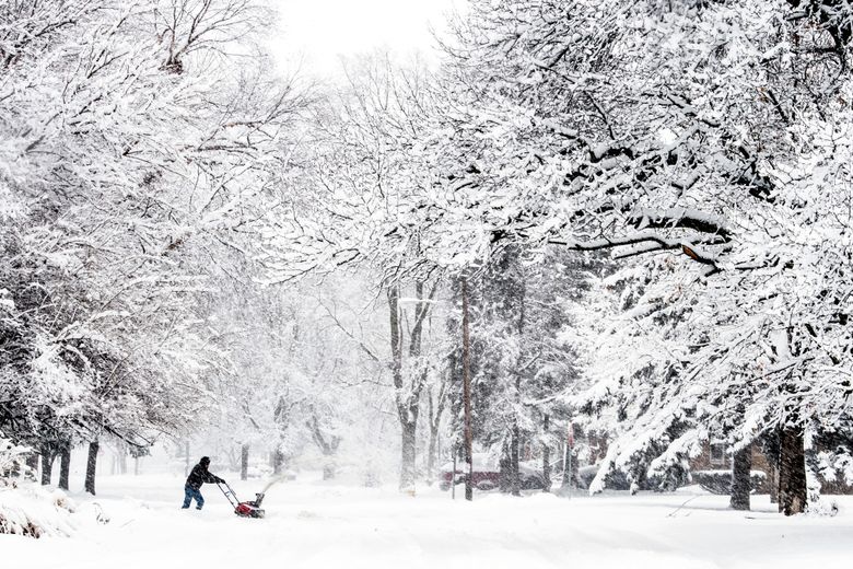 urn-publicid-ap-org-626aba75ddc5a6a89314fe6b45809881APTOPIX_Winter_Weather_Michigan_28560.jpg