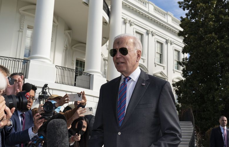 President Joe Biden speaks with reporters before boarding Marine One on the South Lawn of the White House, Wednesday, March 2, 2022, in Washington. Biden is en route to Wisconsin. (AP Photo/Alex Brandon) DCAB108 DCAB108
