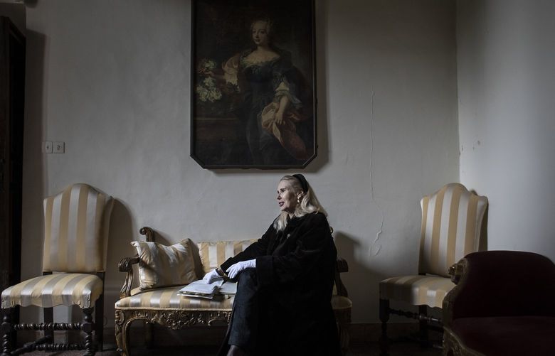 Princess Rita Boncampagni Ludovisi with letters found in a trunk in Villa Aurora, her home for the moment, in Rome, Feb. 18, 2022. Princess Rita Boncompagni Ludovisi, formerly Rita Jenrette, is locked in a battle over the estate of her late husband, a Roman prince. (Nadia Shira Cohen/The New York Times) XNYT68 XNYT68
