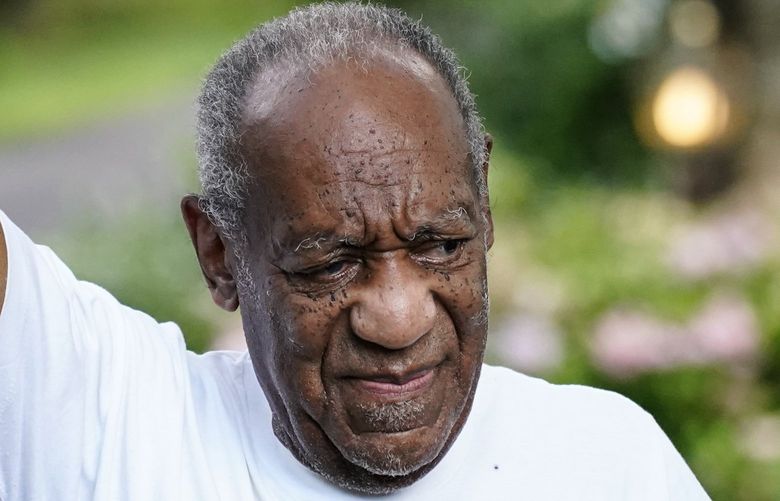 FILE – This June 30, 2021, file photo shows Bill Cosby gesturing outside his home in Elkins Park, Pa., after being released from prison. The Supreme Court said Monday, March, 7, 2022, it will not take up the sexual assault case against Cosby, leaving in place a decision by Pennsylvania’s highest court to throw out his conviction and set him free from prison. The high court declined prosecutors’ request to hear the case and reinstate Cosby’s conviction. The Pennsylvania Supreme Court last year threw out Cosby’s conviction, saying the prosecutor who brought the case was bound by his predecessor’s agreement not to charge Cosby. (AP Photo/Matt Rourke, File) PAKS220 PAKS220