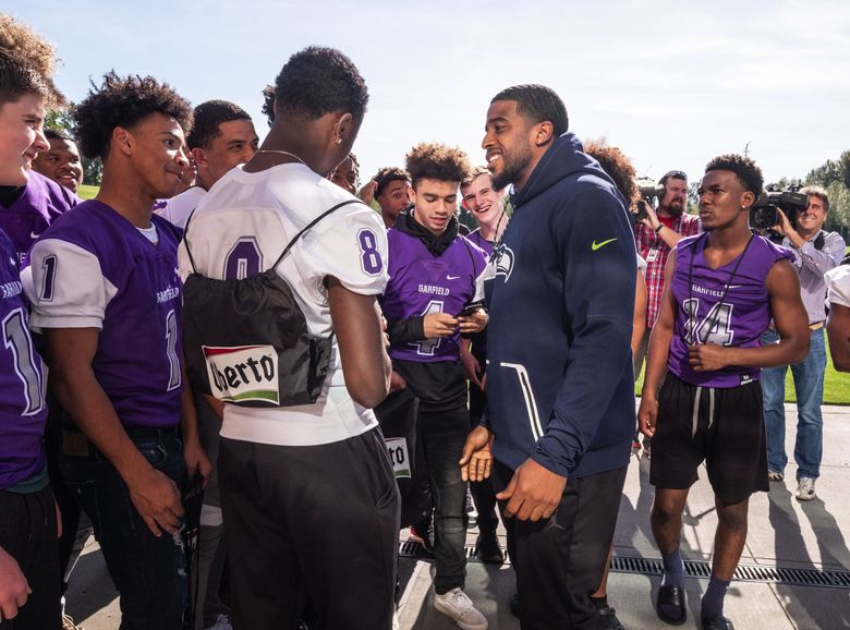 Russell Wilson Named One of 'Earth's Mightiest Athletes' for Philanthropic  Efforts Helping Youth