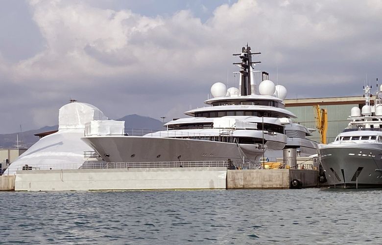 The Scheherazade, which dominates the waterfront in the small town of Marina di Carrara, Italy, March 4, 2022, where it has been moored since September. American officials are examining the ownership of the $700 million superyacht, and believe it could be associated with President Vladimir V. Putin of Russia, according to multiple people briefed on the information. (Gaia Pianigiani/The New York Times) XNYT186 XNYT186